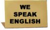 SHOWCASE SIGN "WE SPEAK ENGLISH"